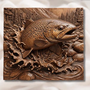 May include: A detailed wooden carving of a brown trout leaping from water. The artwork features a fish with open mouth, water splashing, and a background of trees and mountains. The carving is in shades of brown and is mounted on a square wooden panel.