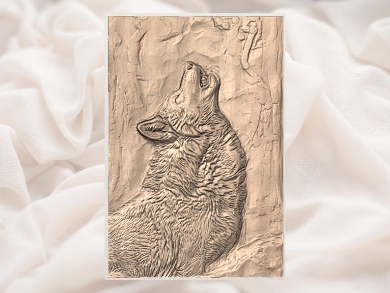 May include: A rectangular, sepia-toned relief carving of a wolf howling upwards. The wolf's fur is detailed with textured lines, and the background has a rough, bark-like appearance. The artwork is set against a soft, white fabric.