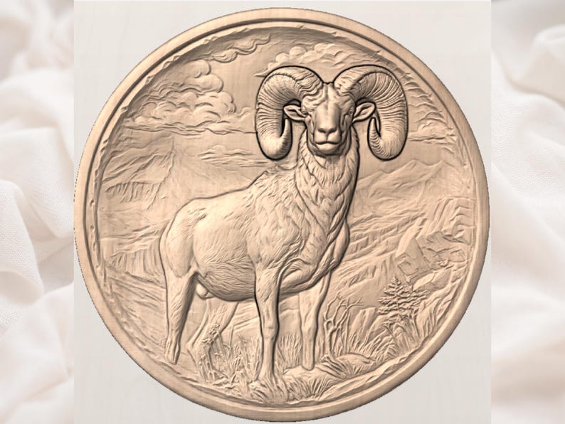 May include: A detailed, circular relief carving of a ram with large, curved horns. The ram stands in a mountainous landscape with a tree. The carving is in a warm, neutral tone, suggesting wood or a similar material. The design is intricate and detailed.