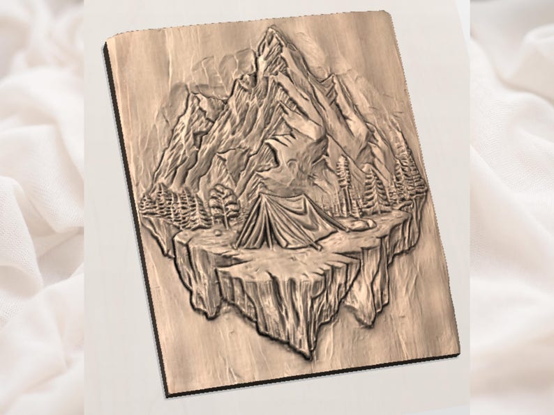 May include: A wooden relief carving depicting a mountain landscape with a tent, trees, and a mountain range. The artwork is in shades of brown and beige, with detailed textures and shadows. The overall theme is camping and nature.