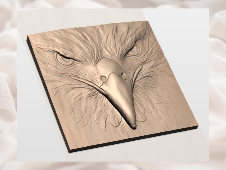 May include: A detailed wood carving of an eagle's head, showcasing intricate feather and facial details. The eagle's beak is prominent, and the eyes convey a stern expression. The carving is mounted on a square wooden base.