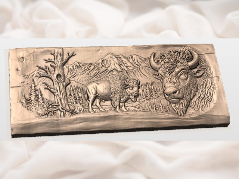 May include: A detailed relief carving of a bison scene. The artwork depicts two bison, a mountain range, trees, and a detailed bison head. The carving is in a natural wood tone, showcasing the texture and depth of the relief.