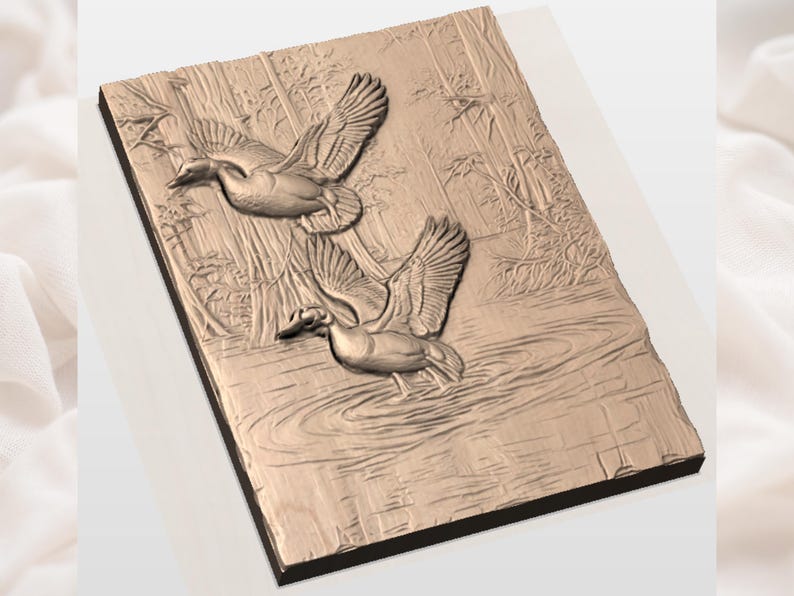 May include: A wooden relief carving featuring two ducks in flight over water. The ducks are depicted with detailed wings and beaks, set against a backdrop of trees and water ripples. The artwork is in shades of brown and beige.