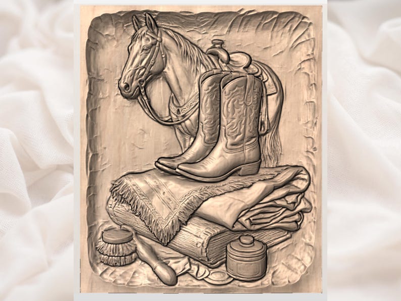 May include: A detailed relief carving depicting a horse with a saddle, cowboy boots, and other western-themed items. The boots are resting on a stack of folded blankets and a book. A brush and small container are also visible.