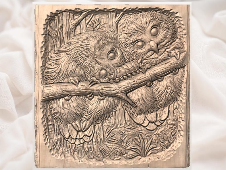 May include: A wooden carving of two owls perched on a branch, surrounded by detailed foliage. The owls are depicted with large eyes and textured feathers, creating a three-dimensional effect. The artwork is set within a rectangular frame.