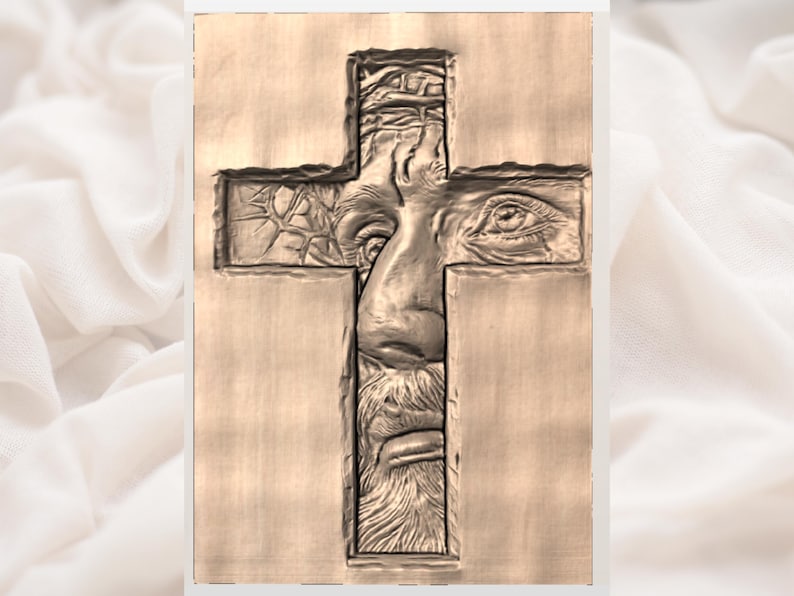May include: A wooden carving of a cross with a detailed relief of a face within the cross shape. The face has a beard and appears to be looking downward. The carving is in shades of brown.