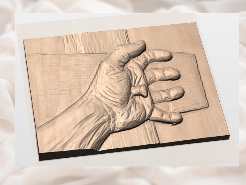 May include: A wooden relief carving of a hand grasping a rectangular object. The hand is detailed with visible veins and wrinkles, and the wood has a natural, light brown color. The carving is mounted on a larger wooden panel.