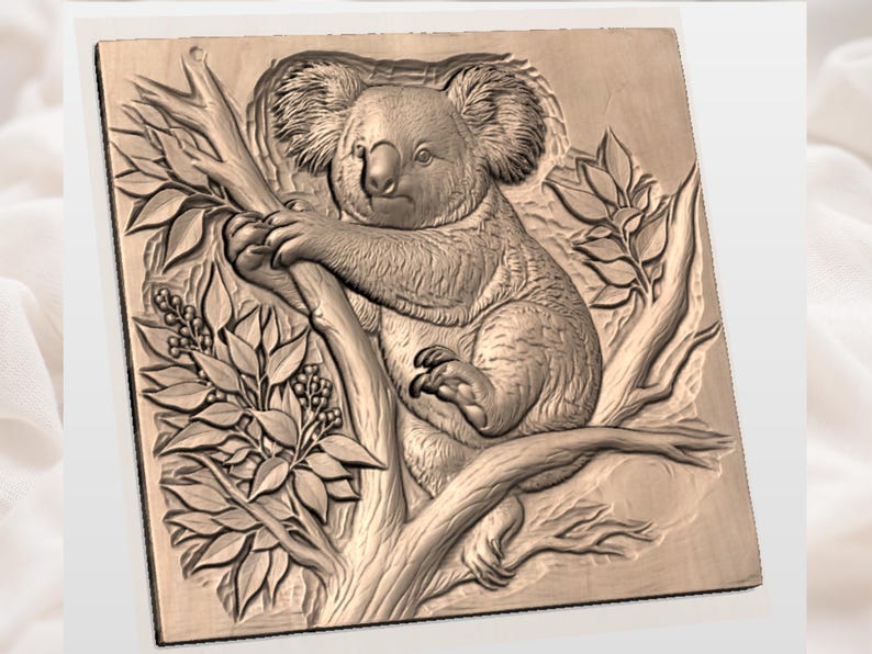 May include: A wooden relief carving of a koala bear perched on a tree branch, surrounded by leaves and berries. The koala is detailed with textured fur and is centered on a square wooden plaque. The carving is in shades of brown.