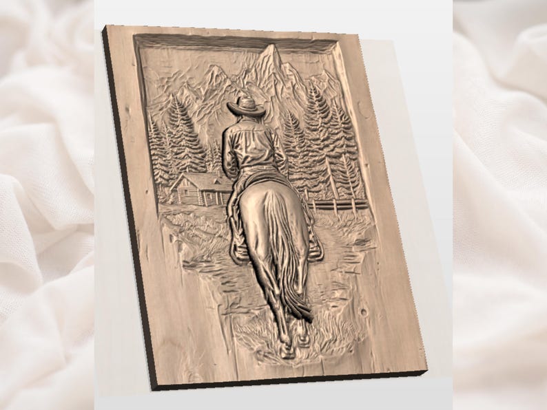 May include: A wooden relief carving depicting a cowboy riding a horse through a mountain landscape. The detailed carving shows a cowboy wearing a hat and riding away from a small cabin and towards a mountain range. The relief is framed by a wooden border.