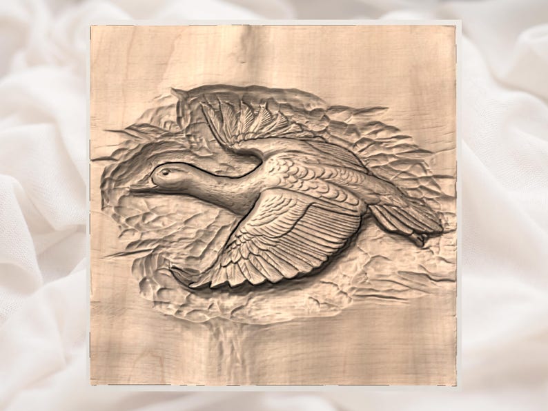 May include: A detailed wood carving of a duck in flight. The artwork features the duck with outstretched wings, carved in a natural wood tone. The carving is set against a textured background, creating a sense of depth and movement.