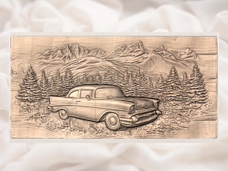 May include: A detailed wood carving of a classic car set against a mountain backdrop. The relief carving shows a vintage car in the foreground, with mountains and pine trees in the background. The artwork is in shades of brown, with intricate details.