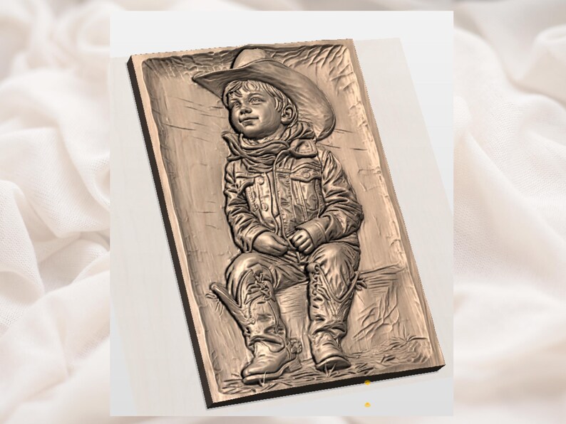 May include: A detailed relief carving of a young child dressed as a cowboy, wearing a hat, jacket, scarf, and boots. The artwork is rendered in shades of brown and tan, with intricate details in the clothing and facial features. The child is seated.