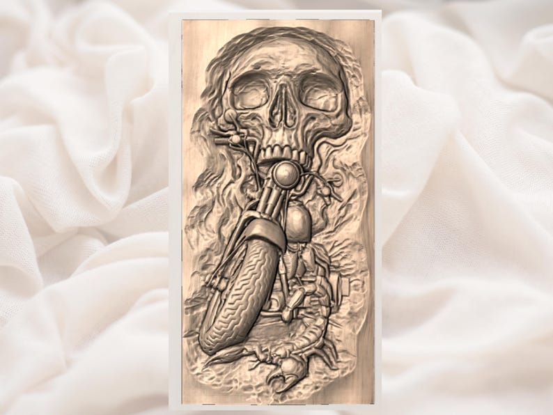 May include: Wooden carving of a skull and motorcycle. The motorcycle's handlebars are in the skull's mouth, with the front tyre visible. The artwork is framed in a white border.