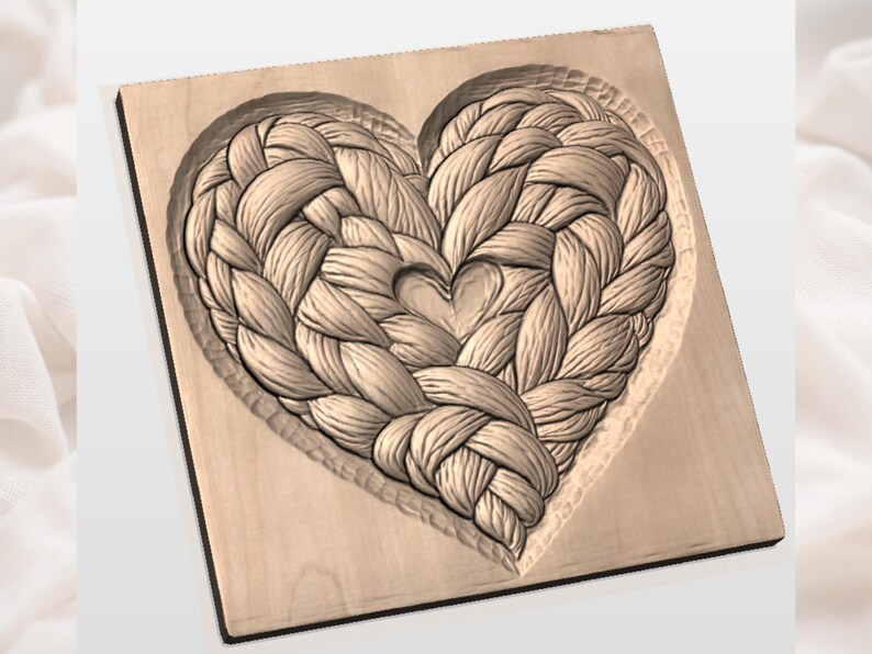 May include: A wooden heart-shaped carving with a woven rope design. The heart is carved into a square wooden plaque. The rope design is detailed and textured, with a smaller heart carved in the center.