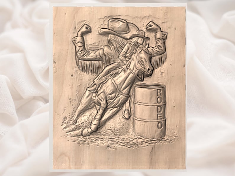 May include: A wooden carving depicts a rodeo scene. A rider on horseback is rounding a barrel, with the word "RODEO" carved on the barrel. The rider wears a cowboy hat and fringed jacket. The carving is in shades of brown.
