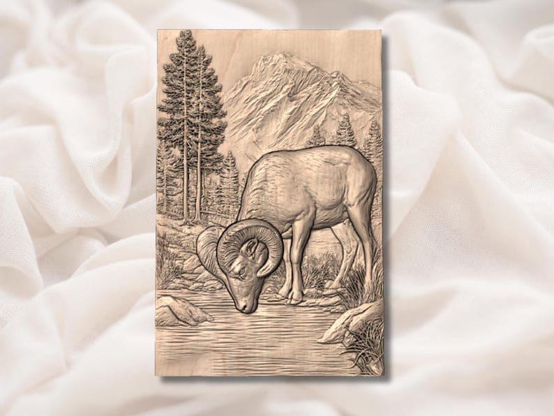 May include: A wooden relief carving depicts a ram drinking from a stream in a mountain landscape. The artwork features detailed carvings of trees, rocks, and a mountain range in the background. The ram has large, curved horns.