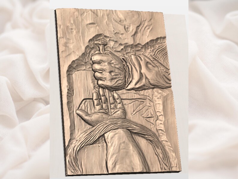 May include: A rectangular, wooden relief carving depicting a hand holding a nail above another hand. The carving is in shades of brown and beige, with detailed textures and shadows. The theme appears to be religious or historical.