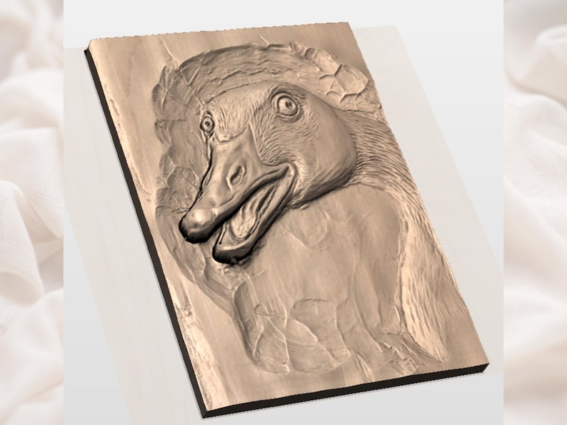 May include: A detailed wood carving of a duck's head, showcasing the bird's open beak and expressive eyes. The carving is in shades of brown and beige, mounted on a rectangular wooden plaque. The duck's features are intricately carved.