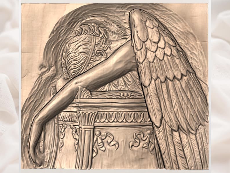 May include: A detailed wood carving depicts a figure with large feathered wings, a draped arm, and a sorrowful expression. The carving is in shades of brown and beige, with intricate details in the feathers and drapery.