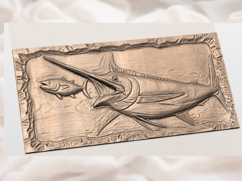 May include: A wooden relief carving of a marlin attacking a smaller fish. The marlin is depicted with its long bill and prominent dorsal fin. The carving is set within a rectangular frame and has a natural wood tone.