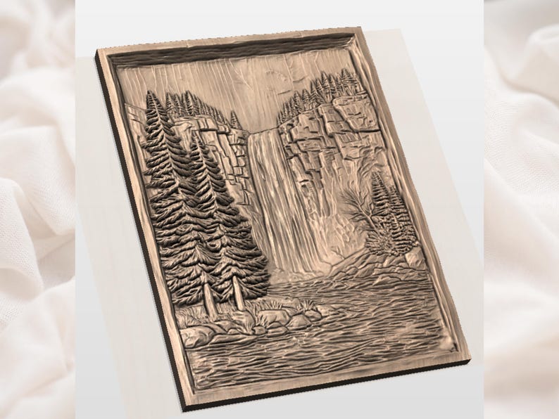 May include: A rectangular, bronze-colored relief carving depicting a waterfall cascading down a rocky cliff face. The scene includes detailed trees, a river, and a textured background, all within a framed border.