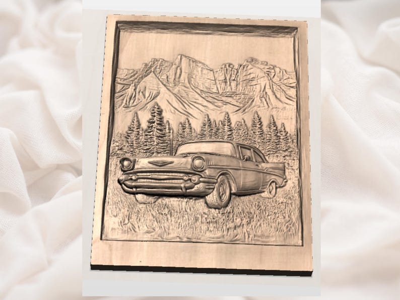 May include: A wooden relief carving depicting a classic car in a mountain landscape. The car is in the foreground, with mountains and trees in the background. The carving is framed in a rectangular shape.
