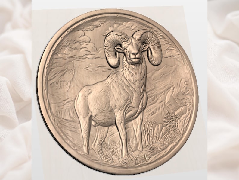 May include: A circular, bronze-colored relief carving of a ram standing in a mountainous landscape. The ram has large, curved horns and is centered in the design. The background features detailed mountain ranges and clouds.