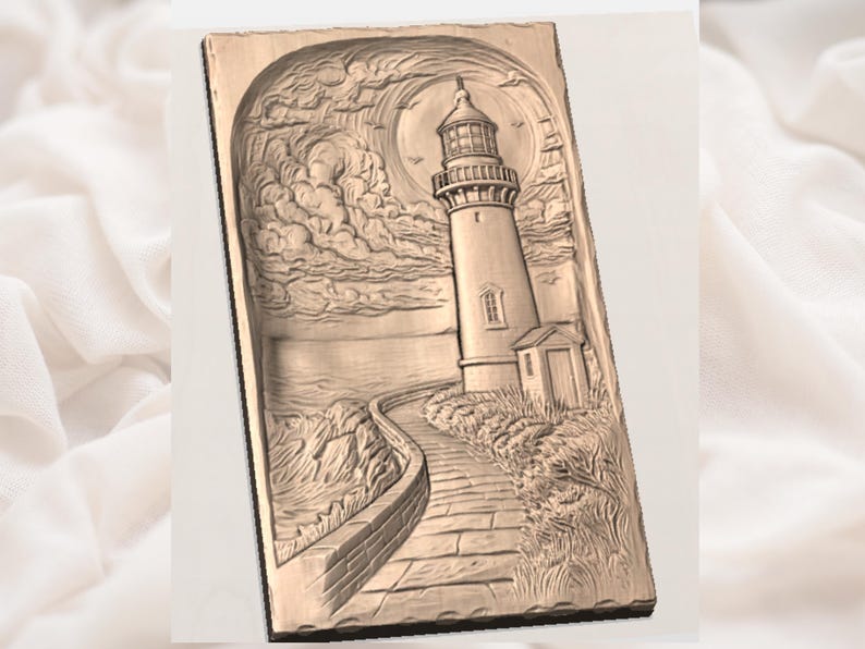 May include: A rectangular, bronze-colored relief carving of a lighthouse scene. The lighthouse stands tall on a cliff, with a path leading to it. The sky features clouds and a sun. The carving is framed by a border.