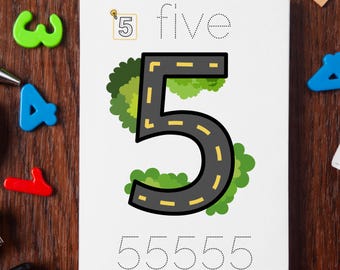 May include: A white educational card with the number five illustrated as a road. The word "five" is written above the road, and the number 5 is in a yellow box. The number 5 is repeated at the bottom of the card.