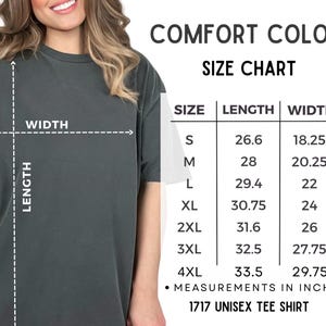 May include: A size chart for a Comfort Colors 1717 unisex tee shirt. The chart shows measurements in inches for sizes S through 4XL. The length measurements range from 67.6 to 85.1 cm, and the width measurements range from 46.4 to 75.6 cm.