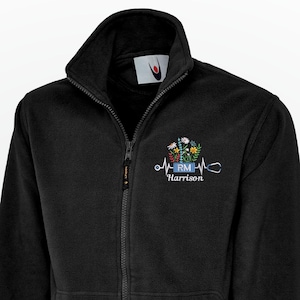 May include: A set of three ceramic mugs with a speckled, matte finish in cream, light grey, and dark grey. Each mug has a simple, minimalist design and a rounded handle.