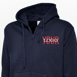 May include: Navy blue zip-up hoodie with a hood and front pockets. The hoodie features the text "YOUR LOGO" in red on the chest. A casual, comfortable garment.