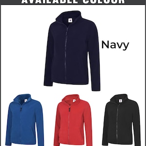 May include: A navy fleece jacket with a full zip, displayed with options in royal blue, red, and black. The text "AVAILABLE COLOUR" is at the top, with "Navy", "Royal", "Red", and "Black" labels.