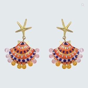 Hand-painted shell-style earrings.