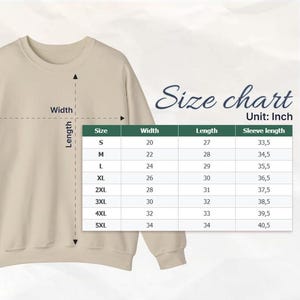 May include: A beige sweatshirt with a size chart overlay. The chart, labeled "Size chart Unit: Inch," details measurements for width, length, and sleeve length in inches for sizes S through 5XL. The sweatshirt is shown with arrows indicating width and length.