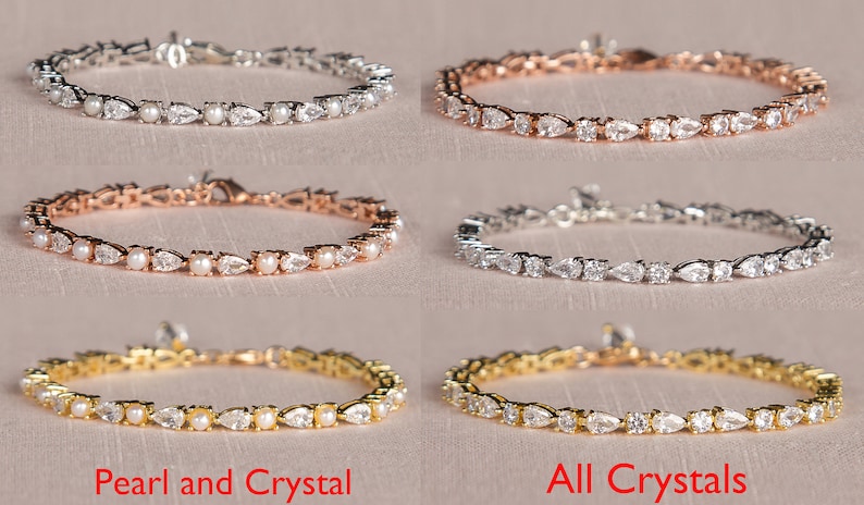 May include: Four bracelets with a silver, rose gold, gold, and silver finish. Each bracelet features a row of pear-shaped crystals and pearls. The bottom two bracelets are labeled "Pearl and Crystal" and "All Crystals".