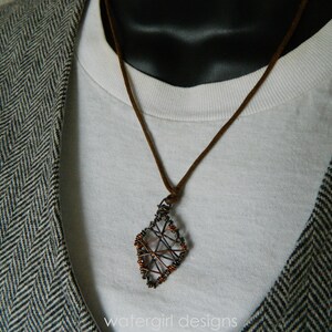 Men&#39;s steel and copper pendant on cotton cord