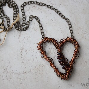 twisted copper heart and garnet pendant