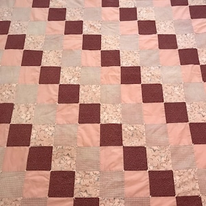 Vintage handmade pink tied quilt-beautiful!