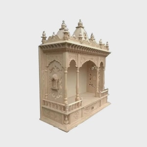 Puede incluir: Un templo de madera beige tallado intrincadamente, con un techo abovedado y m&uacute;ltiples agujas. La estructura presenta aberturas arqueadas, pilares decorativos y tallas en relieve detalladas, creando una apariencia tradicional y ornamentada. Un peque&ntilde;o caj&oacute;n es visible en la base.
