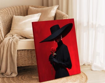 May include: A canvas print featuring a woman in a black dress and wide-brimmed hat, holding a red rose against a red background. The artwork includes long gloves and dangling earrings. The print is displayed on a jute rug.