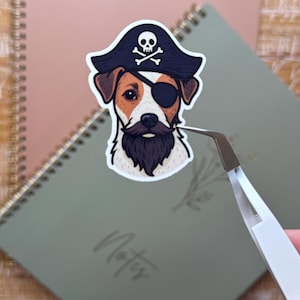 May include: A handmade wooden sign with the text "Welcome" in a playful font. The sign is painted white with a distressed finish, and features a small, decorative heart. Measures approximately 12 inches wide.