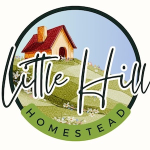 May include: A circular logo with a watercolor illustration of a small house with a red roof on a green hill, set against a blue sky. The words "Little Hill" are in a cursive font, and "Homestead" is in a green banner below.