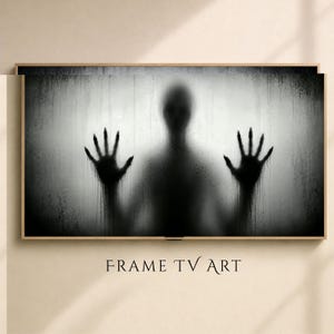 May include: A rectangular digital display featuring a black and white graphic of a shadowy human silhouette behind a textured, frosted glass surface. The figure has hands pressed against the glass with dark, dripping ink-like streaks.