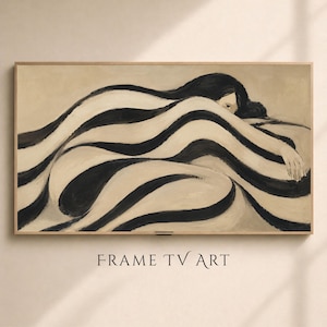 May include: A rectangular wall art piece for a television screen featuring a painting of a figure lying down, wrapped in flowing black and white striped fabric. The figure has dark hair and is positioned against a muted beige background.