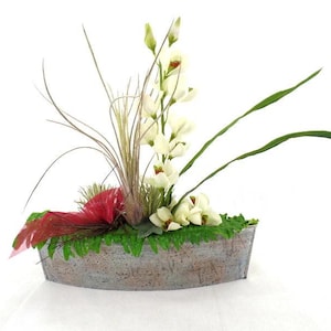 Arreglo de orquídeas con flores artificiales de seda y elipse, lazo burdeos.