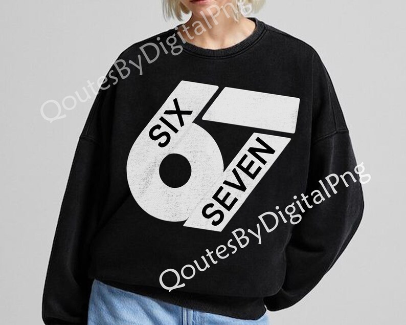 May include: Black crew neck sweatshirt with a large white graphic that reads "SIX SEVEN". The design is a bold, geometric arrangement of the numbers and words. The sweatshirt is a casual style.