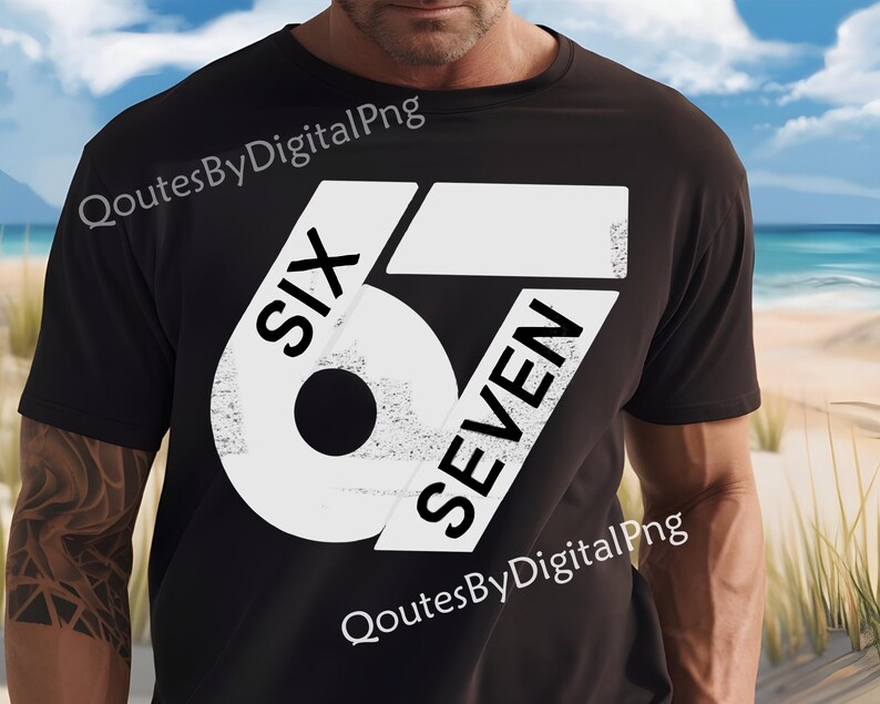 May include: Black t-shirt with a large white graphic design featuring the numbers "6" and "7" with the words "SIX" and "SEVEN" in a bold, sans-serif font. The shirt is worn by a person on a beach.
