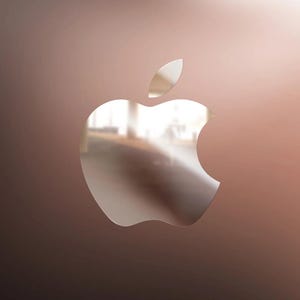 May include: A metallic rose gold Apple logo silhouette centered against a soft, gradient background. The surface of the logo is highly reflective, showing distorted environmental light and shapes within its polished, smooth, and curved contours.