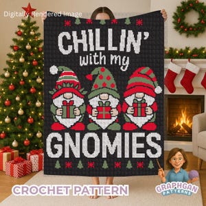 May include: A black blanket with the text "CHILLIN' with my GNOMIES" and three gnome characters holding gifts. The blanket has a Christmas theme with red, green, and white colors.